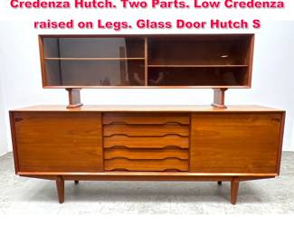 Lot 420 SCOVBY Danish Modern Teak Credenza Hutch. Two Parts. Low Credenza raised on Legs. Glass Door Hutch S