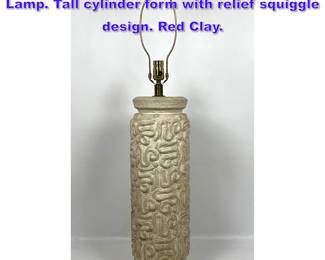 Lot 657 Modernist Glazed Pottery Table Lamp. Tall cylinder form with relief squiggle design. Red Clay. 