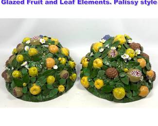 Lot 664 Pair Italian Terracotta Domes with Glazed Fruit and Leaf Elements. Palissy style