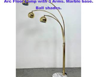 Lot 899 Mid Century Modern Guzzini Style Arc Floor Lamp with 3 Arms. Marble base. Ball shades. 