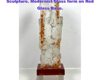 Lot 751 Asian Studio Art Glass Figural Sculpture. Modernist Glass form on Red Glass Base. 
