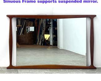 Lot 1050 Elegant Wood Framed Wall Mirror. Sinuous Frame supports suspended mirror. 