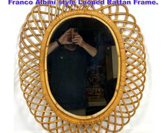 Lot 1017 Scalloped Rattan Oval Mirror. Franco Albini style Looped Rattan Frame.