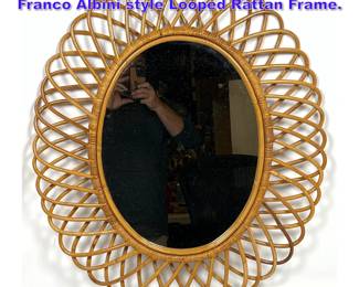 Lot 1015 Scalloped Rattan Oval Mirror. Franco Albini style Looped Rattan Frame.