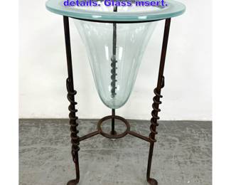 Lot 778 Wrought Iron Stand with twisted iron details. Glass insert.