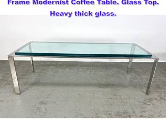 Lot 670 Mid Century Modern Stainless Steel Frame Modernist Coffee Table. Glass Top. Heavy thick glass. 