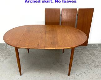 Lot 1101 Danish Modern Teak Dining Table. Arched skirt. No leaves 