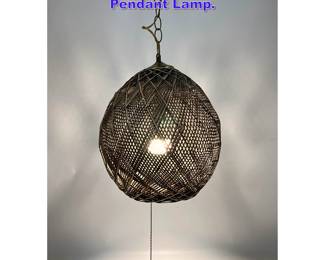 Lot 637 Woven Triangular Pattern Rattan Pendant Lamp. 
