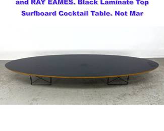 Lot 669 Elliptical Coffee Table. CHARLES and RAY EAMES. Black Laminate Top Surfboard Cocktail Table. Not Mar