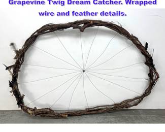 Lot 698 Exceptionally Large Hand Made Grapevine Twig Dream Catcher. Wrapped wire and feather details. 