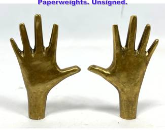 Lot 860 Pair after Aubock Brass Hand Paperweights. Unsigned.