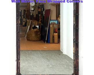 Lot 1087 Lacquered Metal Faux Bamboo Wall Mirror. Faux Wrapped Corners