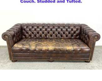 Lot 959 Leather Chesterfield Style Sofa Couch. Studded and Tufted. 