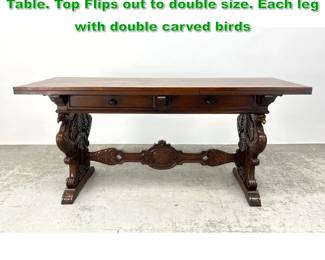 Lot 1545 Heavily Carved Walnut Serving Table. Top Flips out to double size. Each leg with double carved birds