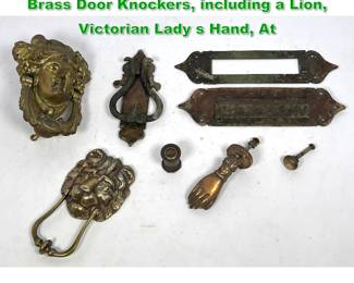 Lot 1544 Classical Brass Door Objects. Four Brass Door Knockers, including a Lion, Victorian Lady s Hand, At