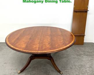 Lot 1525 Ethan Allen Newport Banded Mahogany Dining Table. 