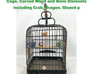 Lot 1576 Vintage Wicker Finch Asian Bird Cage. Carved Wood and Bone Elements including Crab, Dragon. Glazed p