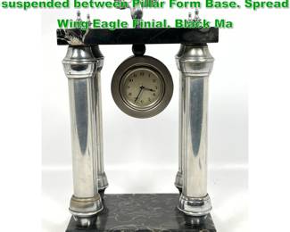 Lot 1367 Italian 4 Column Mantle Clock suspended between Pillar Form Base. Spread Wing Eagle Finial. Black Ma