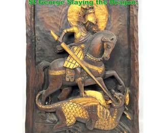 Lot 1348 Polychrome Carved wood Panel of St George Slaying the Dragon. 