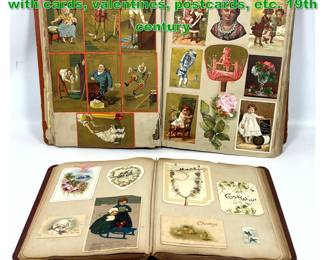 Lot 1477 2 extensive Victorian scrapbooks with cards, valentines, postcards, etc. 19th century