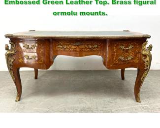 Lot 1606 French style Inlaid Wood Desk. Embossed Green Leather Top. Brass figural ormolu mounts.