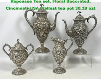 Lot 1300 LORING ANDREWS Heavy Repousse Tea set. Floral Decorated. Cincinnati USA. Tallest tea pot 30.38 ozt