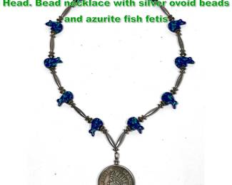 Lot 1344 USA $1 1851 Coin Necklace. Indian Head. Bead necklace with silver ovoid beads and azurite fish fetis