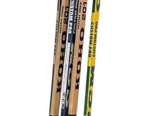 5 Hockey Sticks And 2 Hockey Helmets