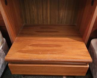 Beside Cabinet.