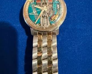 ACCUTRON with 14K Bezel protective plastic still on face on watch! Most sought after ACCUTRON more information to follow