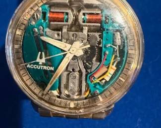 ACCUTRON with 14K Bezel protective plastic still on face on watch! Most sought after ACCUTRON more information to follow