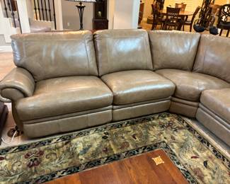 Tan “Natuzzi like” 5 piece sectional w 2 recliners. 10’L each way, 39” d 36”t
$ 2,500.00