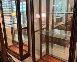 (2) matching Pulaski 2-way sliding door, lighted, Curio Cabinets. 42.75”w 16.25”d 79.5”t. $600.00 each