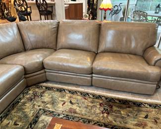 Tan “Natuzzi like” 5 piece sectional w 2 recliners. 10’L each way, 39” d 36”t
$ 2,500.00