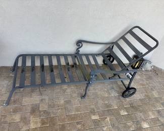 Cast Aluminum lounger with cushion 76”L 27.5”w 17”-40”t. $125.00