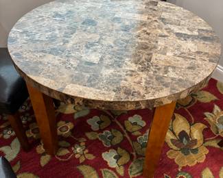 Round kitchen table (4) black vinyl chairs. Tbl: 40” diameter 29.5” t chairs: 19” w 17”d 38”t. $ 225.00