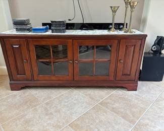 TV stand/ storage table.
60”w 17”d 27”t. $ 150.00