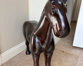 Wood horse 32”L 9”w 31.5”t. $ 100.00