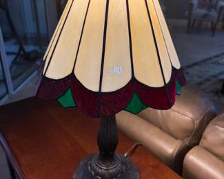 Tiffany style table lamp metal base. Red top & bottom 6” base 20”t $125.00