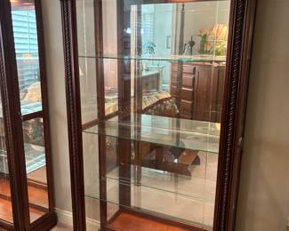 2) matching Pulaski 2-way sliding door, lighted, Curio Cabinets. 42.75”w 16.25”d 79.5”t. $600.00 each