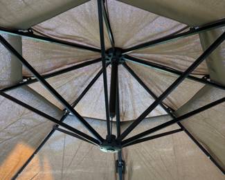 Adjustable Brown Umbrella with base and cover. 8’6”T 36”base Span 11’
$200.00