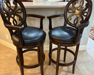 Front gate “Kristina” heavy wood swivel Bar Stools. 23”w 19” d 48”t. Floor to seat 30” counter height $ 300.00 pair