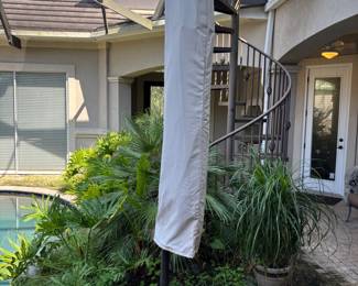 Adjustable Brown Umbrella with base and cover. 8’6”T 36”base Span 11’
$200.00