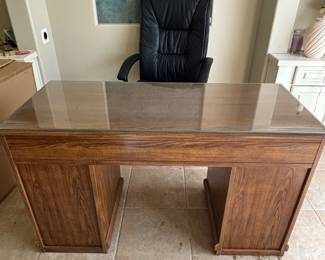 Desk faux wood finish glass top 9 drawers. 52”w 22”d 30.5”t $ 75.00