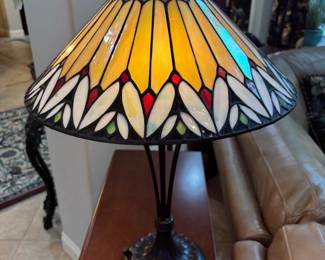 Tiffany style table lamp metal base. Tall yellow flared. 7” base 26” t. $ 150.00