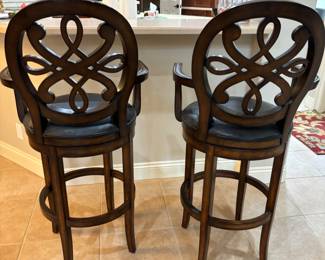 Front gate “Kristina” heavy wood swivel Bar Stools. 23”w 19” d 48”t. Floor to seat 30” counter height $ 300.00 pair