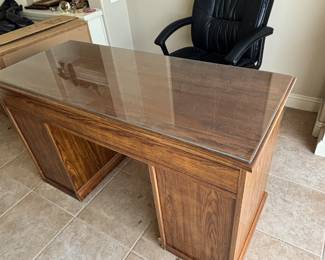 Desk faux wood finish glass top 9 drawers. 52”w 22”d 30.5”t $ 75.00