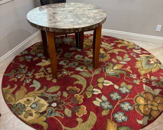 Sphinx Infinity Oriental Weavers 92” diameter red floral rug. $250.00