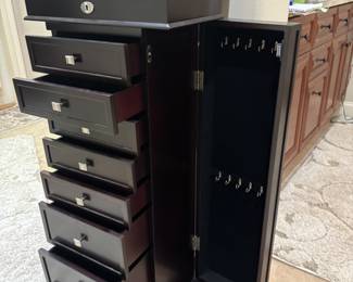 Black jewelry chest 9 compartments 2 doors. 17”w 10.25”d 40.5”t
$ 175.00