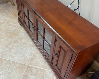 TV stand/ storage table.
60”w 17”d 27”t. $ 150.00